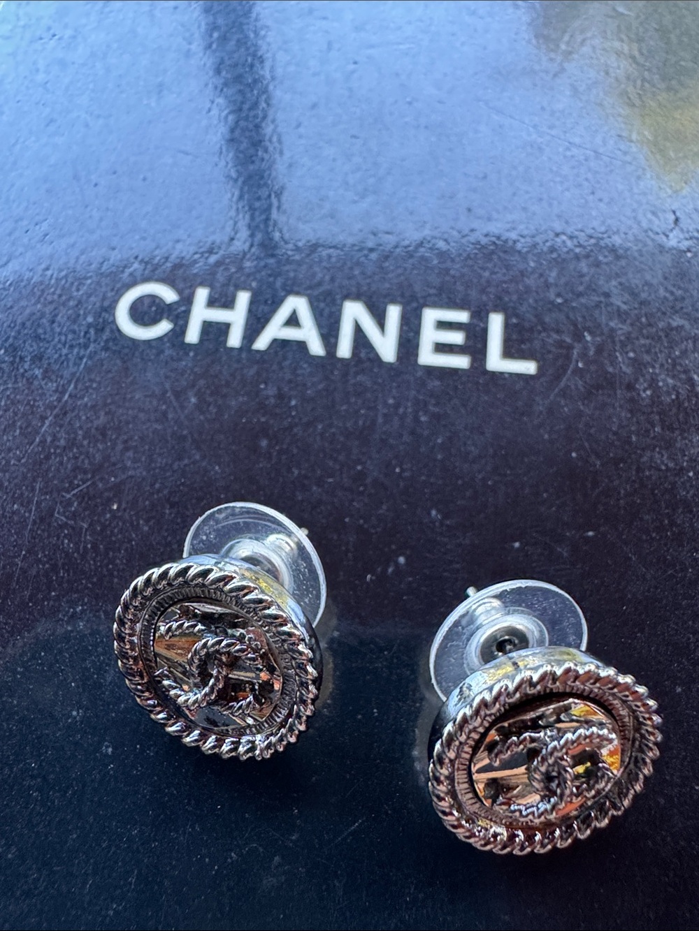 CHANEL Pierced Silver Rope-Edge CC Button Stud Earrings